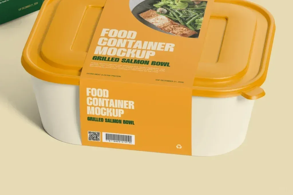 PSD Mockup Lunch Box Containers, Two square food containers with yellow lids and orange packaging wrap on a beige background.
