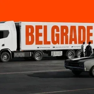 PSD Mockup OTR Truck Realistic, White OTR truck with large BELGRADE text on trailer and two men standing nearby