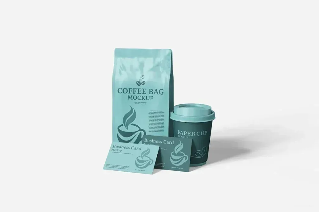 PSD Mockup Coffee Branding Packaging, Blue coffee bag, paper cup, and business cards with coffee branding mockup