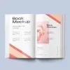 PSD Mockup Book on Minimal, Open book mockup on a light blue background with clean pages and pink accents
