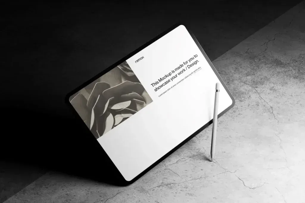 PSD Mockup iPad Realistic Device, Realistic iPad device with stylus on textured surface showing design mockup