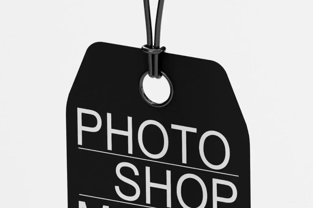 PSD Mockup Label Tag, Black hanging label tag with a hole and cord, showing PHOTO SHOP text
