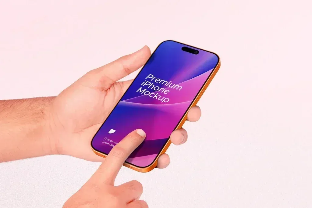PSD Mockup Phone in Hand, Hand holding a smartphone mockup with a purple and pink screen on a white background