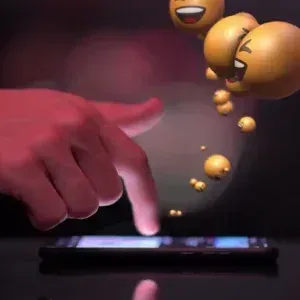 Laughing Emojis Burst from Screen Stock Footage Laughing Emojis Burst from Screen Stock Footage