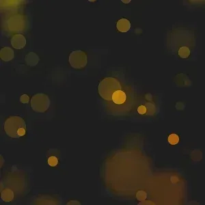 Golden Bokeh Particles Video on Dark Stock Footage Golden Bokeh Particles Video on Dark Stock Footage