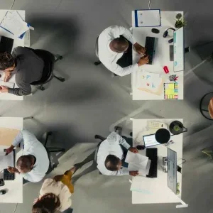Bird’s Eye View of Professionals Working in Modern Open Office Stock Footage Bird’s Eye View of Professionals Working in Modern Open Office Stock Footage