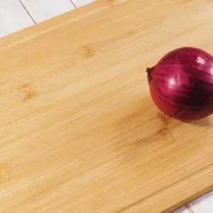 Red Onion Slicing on Wooden Board Stock Footage Red Onion Slicing on Wooden Board Stock Footage