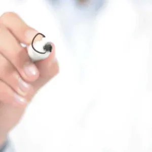 Man in Lab Coat Writing Cancer Stock Footage Man in Lab Coat Writing Cancer Stock Footage