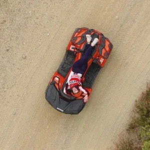 Aerial Man Relaxing on ATV Stock Footage Aerial Man Relaxing on ATV Stock Footage