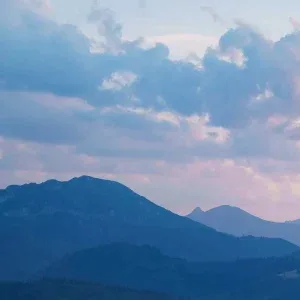 Clouds Over Mountain Range Stock Footage Clouds Over Mountain Range Stock Footage