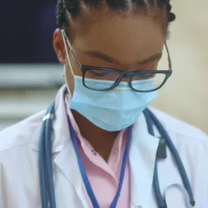 Doctor Writing Chart in Hospital Stock Footage Doctor Writing Chart in Hospital Stock Footage