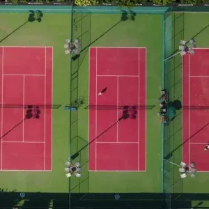 Bird’s-Eye Tennis Matches on Vibrant Stock Footage Bird’s-Eye Tennis Matches on Vibrant Stock Footage