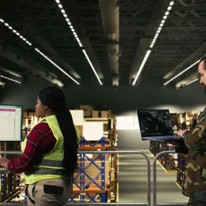 Warehouse Workers Using Computers Stock Footage Warehouse Workers Using Computers Stock Footage
